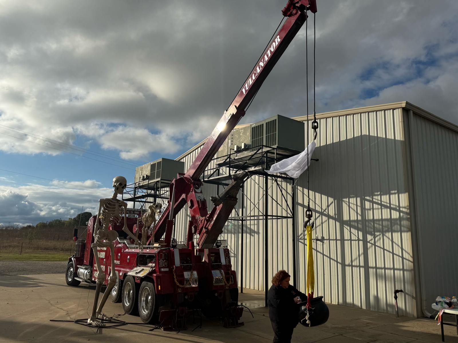 Brown & Sons heavy wrecker with its Vulcanator boom extended outside the Shawnee shop